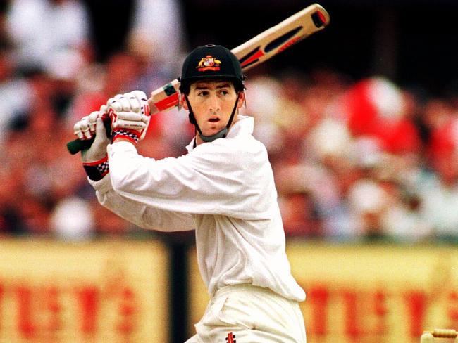 Matthew Elliott throws his hands at a cut shot during the 1997 Ashes tour.