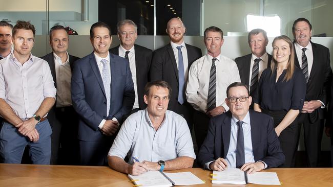 Panthers chief executive Brian Fletcher and Richard Crookes Construction's managing director, Jamie Crookes, sign the contract for the new $88 million conference and community centre. Picture: Supplied.