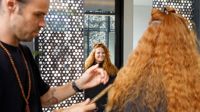 Chris Hunter cuts the hair of Bridgette Birchall at his salon, Willomina, in Sydney’s Woollahra. Picture: Max Mason-Hubers