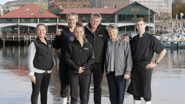 Three generations of the Mure family are pictured in front of their business at Constitution Dock, Hobart in 2017. (L-R) Jude, Wilson, Eve, Will, Jill, Jock Mure. PIC: MATT THOMPSON