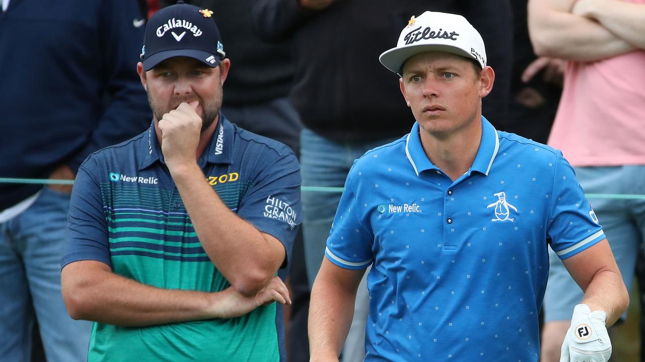 Marc Leishman and Cameron Smith of Australia look on during the 2018 World Cup of Golf. (Photo by Scott Barbour/Getty Images)