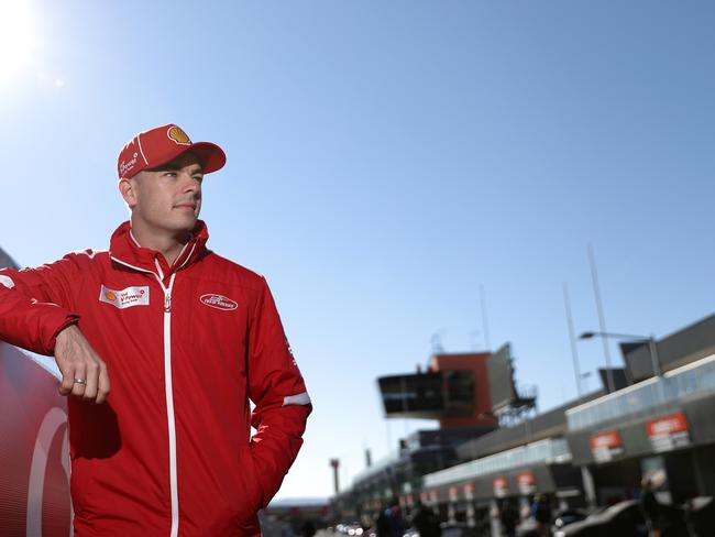 Scott McLaughlin driver contemplates what Sunday will bring while standing in pit lane.