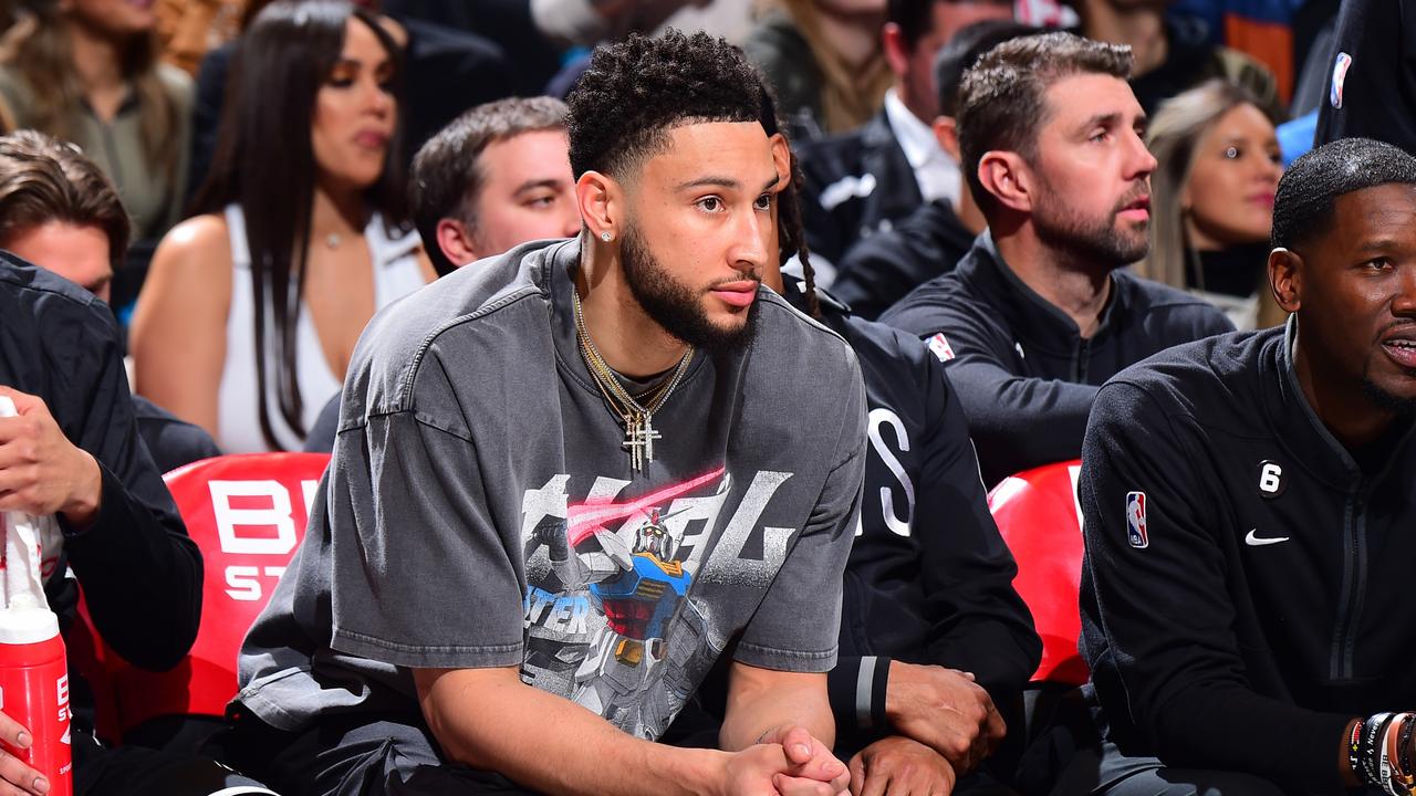 Simmons watching on from the bench. (Photo by Brian Babineau/NBAE via Getty Images)