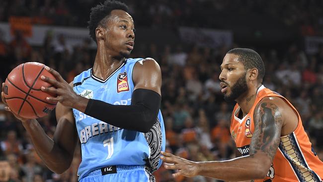 Taipans defensive dynamo DJ Newbill did a number on Breakers scoring machine Scotty Hopson. Picture: Getty Images