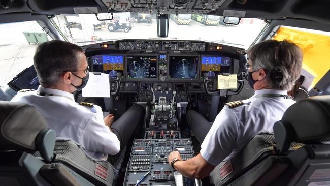 Pilots in the cockpit of a Boeing 737 MAX aircraft operated by low-cost airline Gol as it sits on the tarmac before take off at Brazil’s Guarulhos International Airport. Picture: AFP