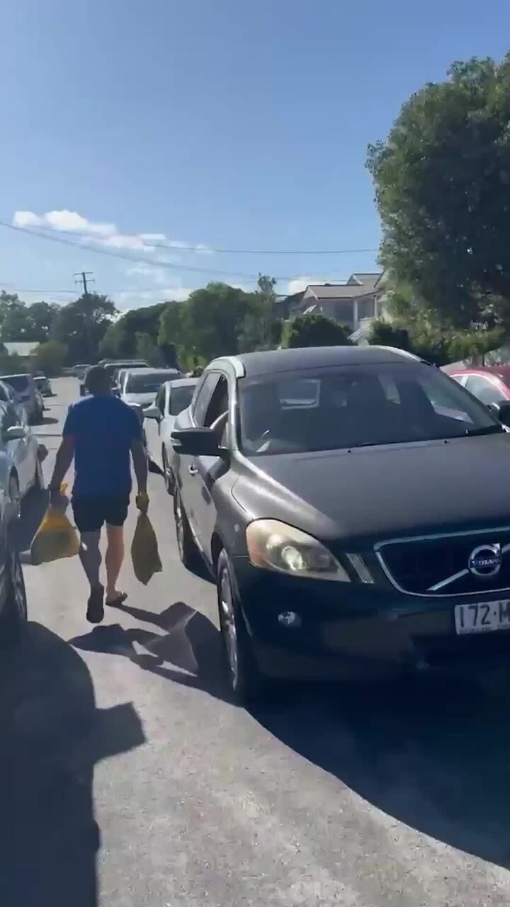 The queue for sandbags on Brisbane's southside