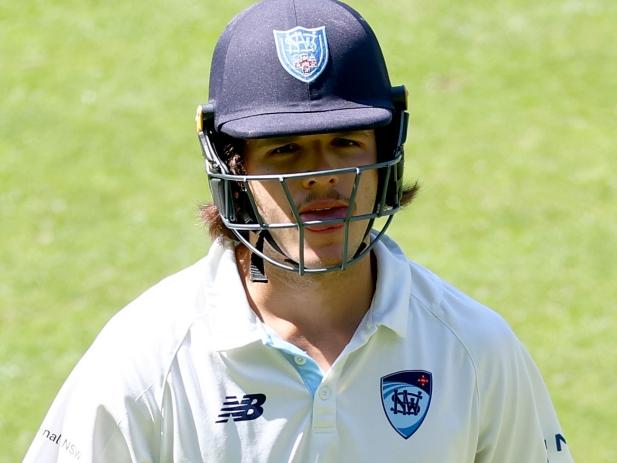 MELBOURNE, AUSTRALIA - OCTOBER 21: Sam Konstas of New South Wales walks off after he was dismissed by Scott Boland of Victoria during the Sheffield Shield match between Victoria and New South Wales at Melbourne Cricket Ground, on October 21, 2024, in Melbourne, Australia. (Photo by Josh Chadwick/Getty Images)