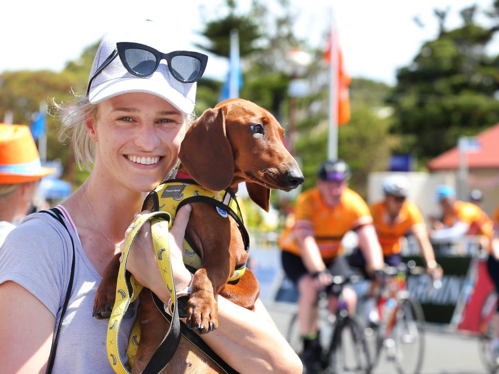 On Saturday 19 January 2019, Challenge Tour riders tackled the same route as the professional riders from Glenelg to Strathalbyn in the ultimate test of stamina. Lauren Benson with her dog Coffee, from Loxton. (AAP Image/Dean Martin)