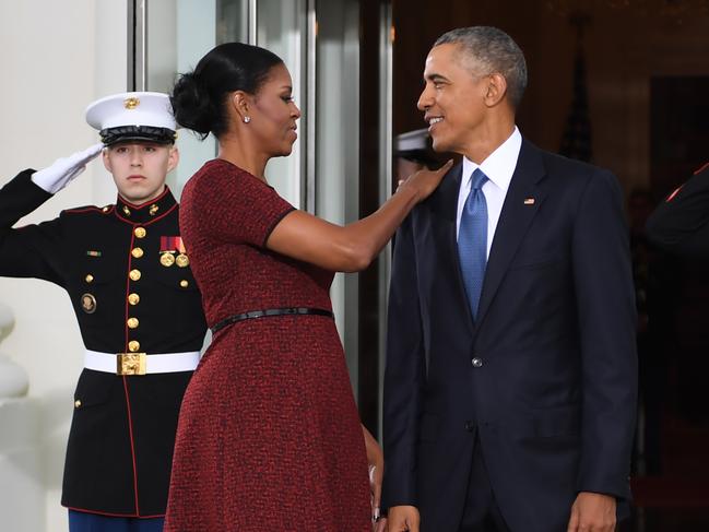 President Barack Obama and First Lady Michelle Obama prepare to greet President-elect Donald Trump and his wife Melania to the White House in Washington, DC on January 20, 2017. Picture: AFP