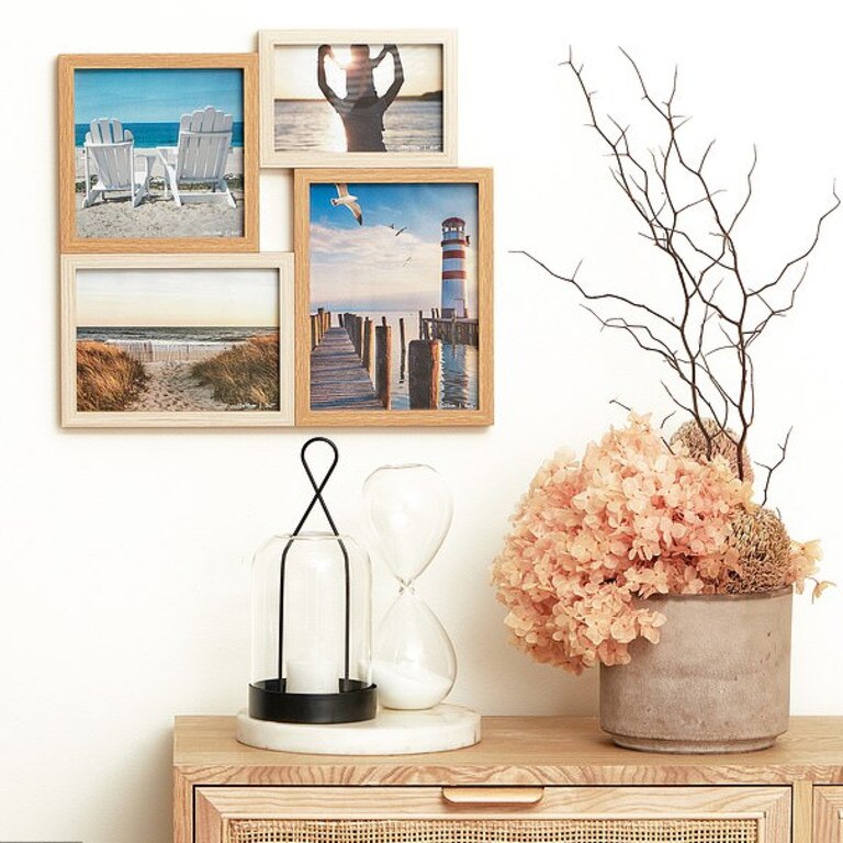 It also includes stylish photo frames or store bouquets of flowers in the glass vase set for $9.99. Picture: Supplied