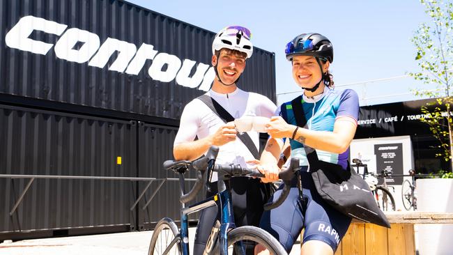 Cyclists Patrick Sharrad and Jemma Zeilonka enjoy a coffee at Ride Contour. Picture: The Advertiser/Morgan Sette