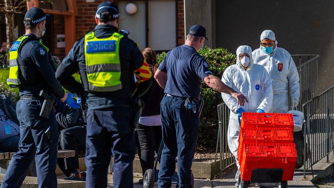 Flemington public housing tower residents receive a resupply of goods during lockdown. Picture: Jake Nowakowski