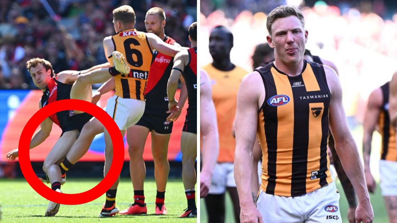 James Sicily kicks out against Essendon. Photos: Getty Images