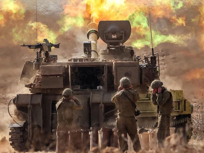 An Israeli army self-propelled howitzer fires rounds near the border with Gaza in southern Israel after the Hamas terrorist attack in early October. Picture: AFP