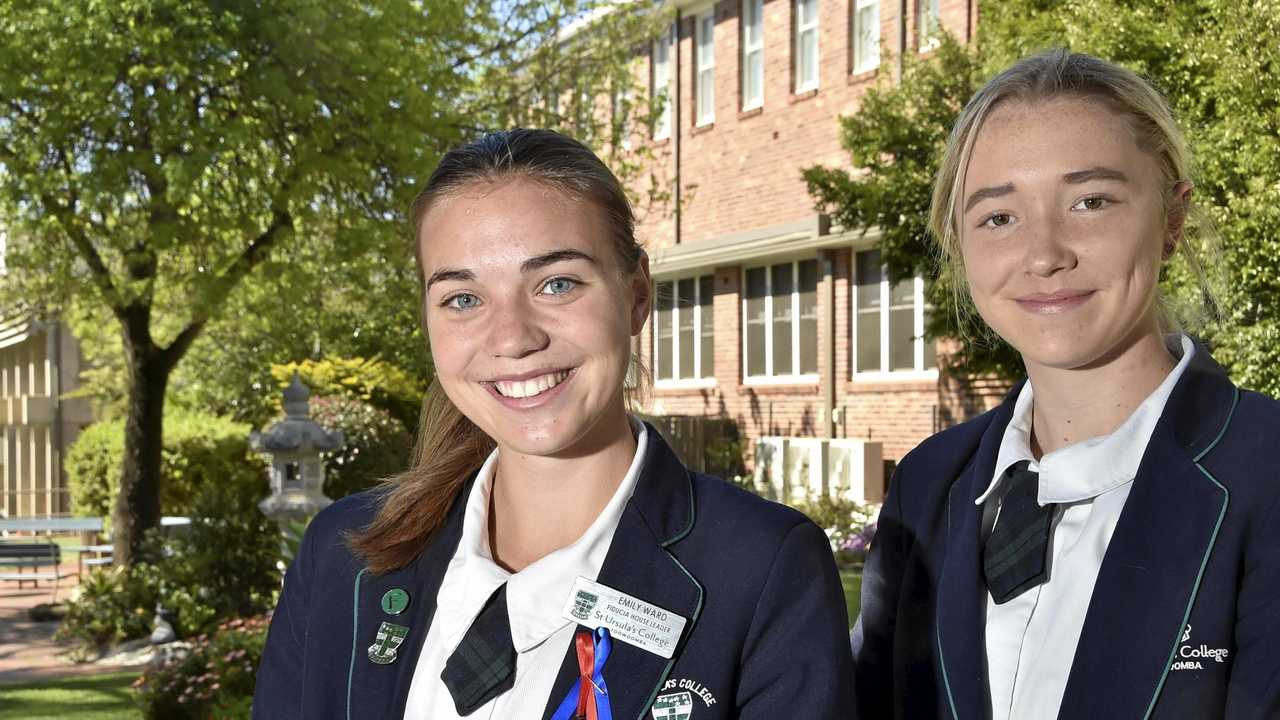 YOUNG STARS: St Ursula's College students Emily Ward (left) and Chloe Hutton are enjoying the challenges of representative football. Ward recently featured in the Australian touch team at the Youth World Cup and Hutton will play for the Queensland under-19 side at the School Sport Australia Football Championships. Picture: Bev Lacey