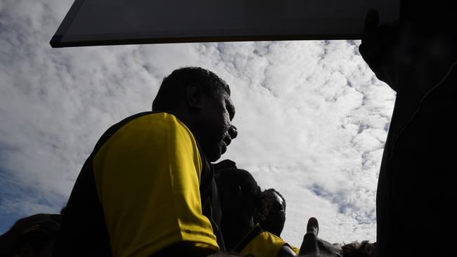 Tigers coach rallies the team during three-quarter break during 2022 Tiwi Grandfinal. Picture: (A)manda Parkinson