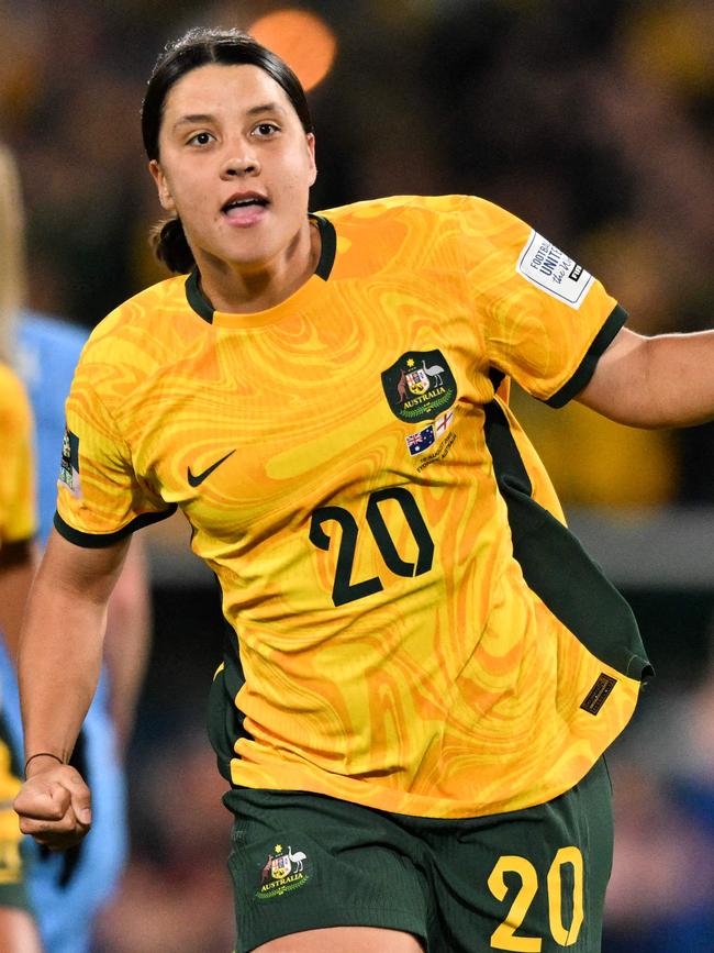 Sam Kerr celebrating a goal. Photo by IZHAR KHAN / AFP.