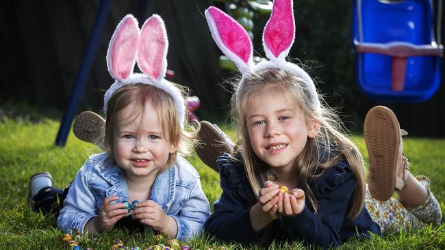 Victoria, 2, and Isla, Smith, 6, prepare for the RHHRF At Home Easter egg Hunt at Moonah. Picture Chris Kidd