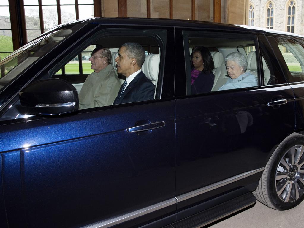 Prince Philip drives the Queen and the Obamas at Windsor in 2016. Picture: WPA/Getty Images