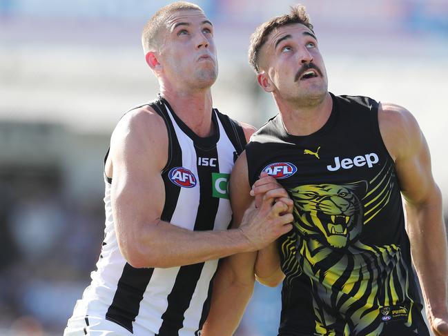 Marsh Community Series. Collingwood vs Richmond in the Norm Winns Oval in Wangaratta..01/03/2020.   Darcy Cameron of the Magpies and Ivan Soldo of the Tigers    . Pic: Michael Klein