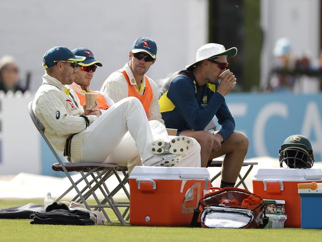 (L-R) David Warner, Tim Paine, Travis Head and Pat Cummins of Australia look on from the sidelines during day one of the Tour Match between Derbyshire CCC and Australia. Picture: Ryan Pierse/Getty Images