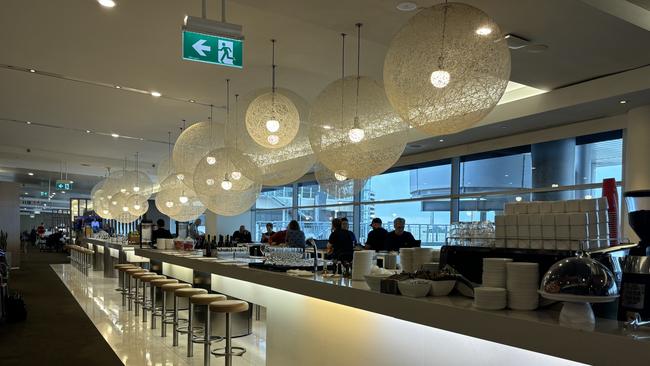 The wine bar in the Qantas Lounge at Sydney Airport. Picture: Elyse Popplewell