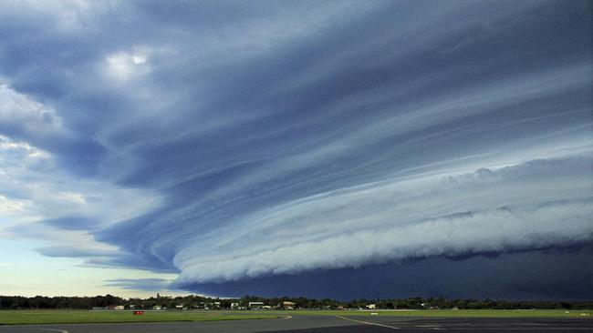 Sunshine Coast Airport employee was on the tarmac waiting for an aircraft when he saw a shelf cloud loom in from the southwest. Picture: Shane Loweke.