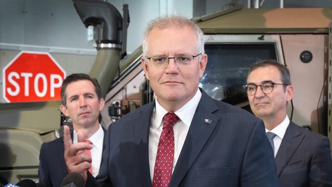 Prime Minister Scott Morrison in Adelaide with Finance Minister Simon Birmingham, and former SA Premier Steven Marshall. Picture: Dean Martin