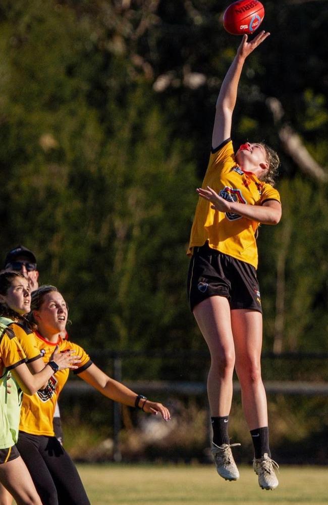 Bianca Lyne springs for a tap at training this week. Picture: Jasmine Bennett