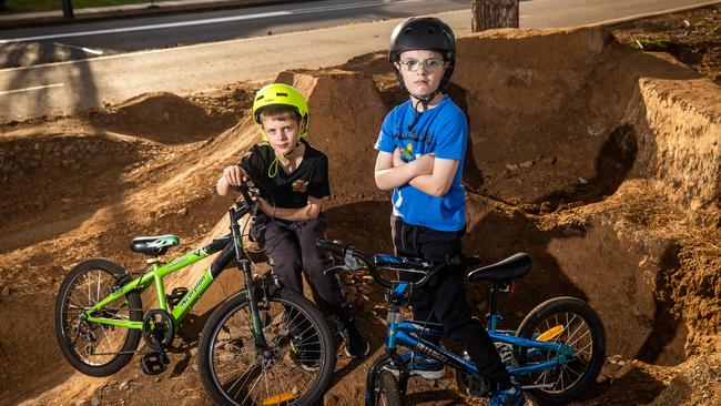 Caleb, 7, and Sebastian, 9, were left heartbroken by DIT's initial decision to bulldoze local BMX jumps at Railway Terrace in Edwardstown. Picture: Tom Huntley