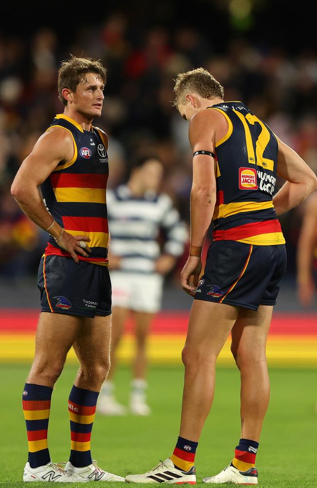 Matt Crouch and Jordan Dawson following the Crows’ loss to Geelong on Friday night. Picture: Sarah Reed/AFL Photos via Getty Images