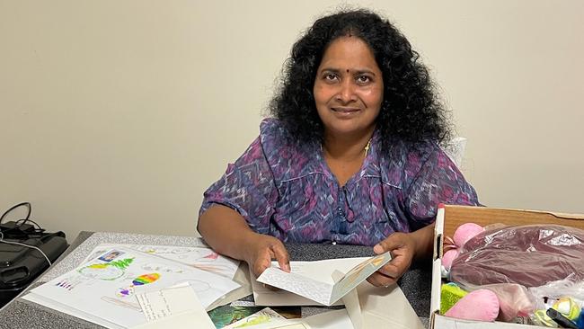 Priya Nadesalingam with some of the letters sent to her family while in detention.