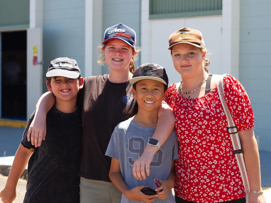 Tyler Christian, Amelia Christian, Jensen Schirok and Isabella Christian head towards the sideshows at the 2023 Murgon Show.