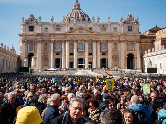 Tourists and pilgrims visit St Peter's square in The Vatican as Pope Francis is still hospitalised with pneumonia and did not lead the Angelus prayer for the third consecutive Sunday. Picture: AFP