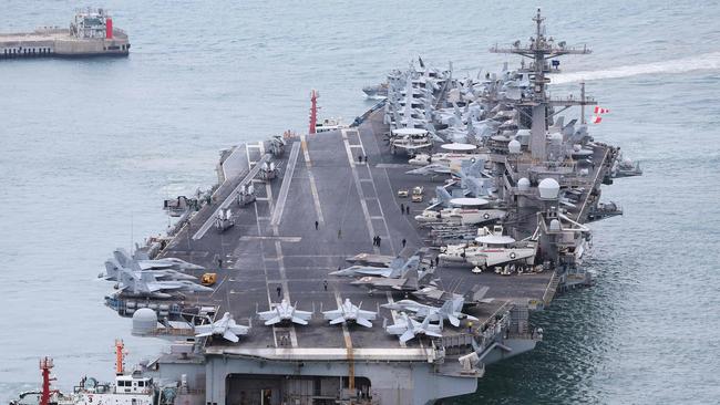 The USS Carl Vinson, a US nuclear-powered aircraft carrier, docks in the South Korean port of Busan on March 2, 2025. Picture: AFP