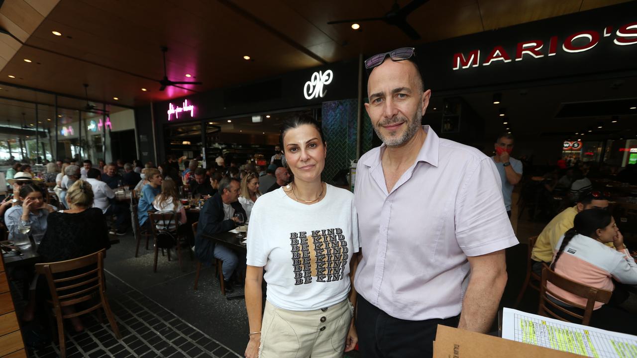 Shop keepers, visitors and Locals during Easter Sunday in the Broadbeach Mall. Mario's restaurant owners Tass and Tina Arhon. Pic Mike Batterham