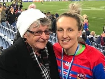 St George Dragons player Holli Wheeler and her biggest fan.