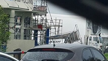 Fallen scaffolding as wild weather hits Cairns.