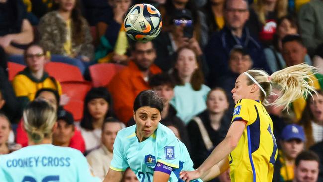 Sam Kerr heads the ball during the match at Brisbane Stadium. Picture: Patrick Hamilto/AFP