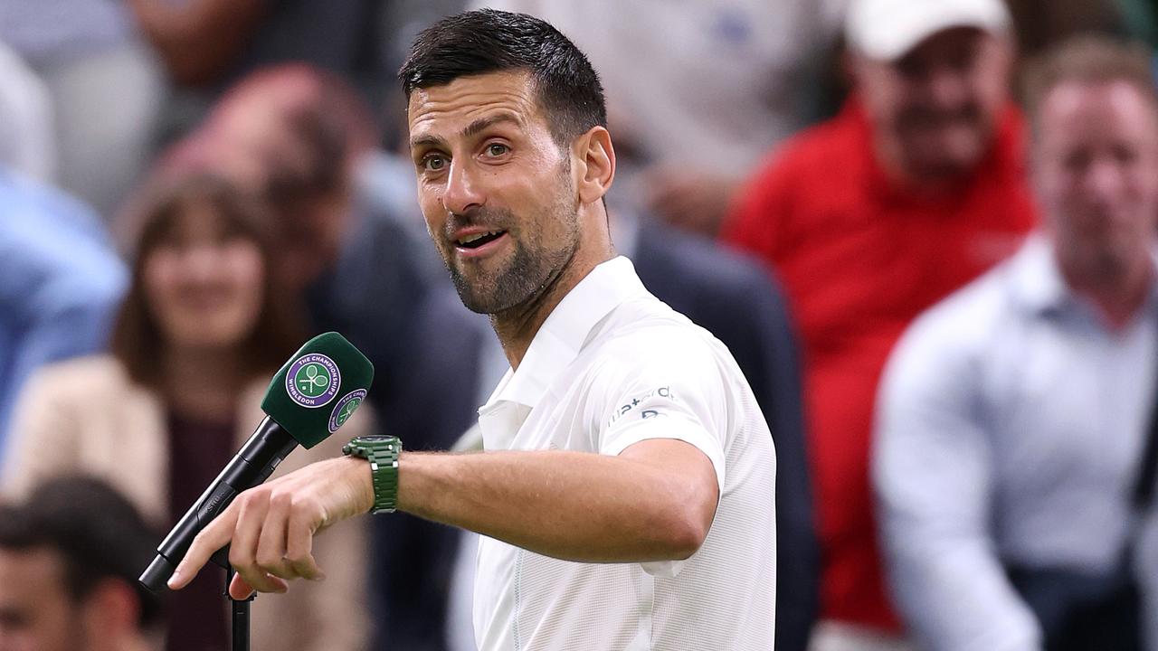 Novak Djokovic addresses the crowd on Centre Court following victory against Holger Rune.