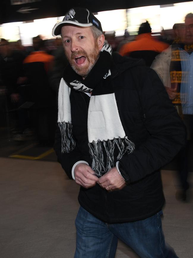 Fans are arriving this morning. A Collingwood MCC member heads in early. Picture: AAP Image/Julian Smith