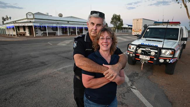 Senior Constable Stephan Pursell with wife Sharon in the main street of Birdsville. Picture: Lyndon Mechielsen/The Australian