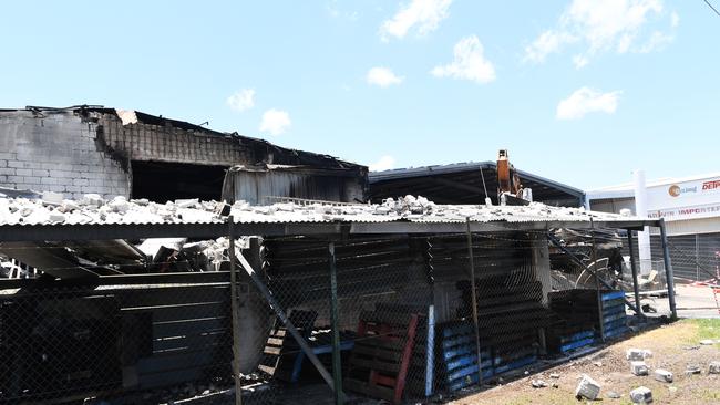 NT Oriental Emporium apparently being bulldozed after it was lit on fire. Picture Katrina Bridgeford.