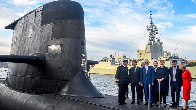 French President Emmanuel Macron, second left, with then Australian Prime Minister Malcolm Turnbull in 2018. Picture: AFP