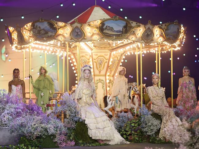 Models pose on a carousel during the Romance Was Born show. Picture: Brendon Thorne/Getty Images