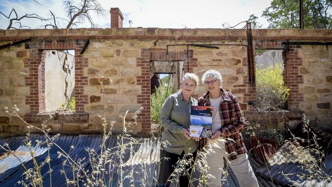 Denise Elland and Jan Verrall with their new book, Sampson Flat Bushfire, January 2015, A History: 100 Individual Accounts of Lessons Learned. Picture: Roy VanDerVegt