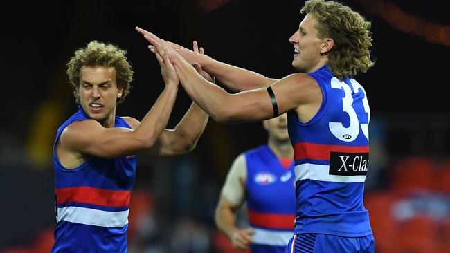 Aaron Naughton celebrates a goal with Mitch Wallis. Picture: Getty Images