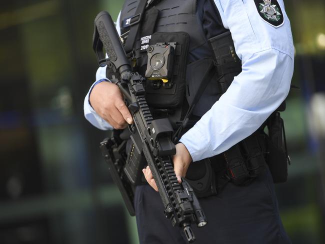 An Australian Federal Police (AFP) officer holding an MK18 Short Barreled Rifle. Picture: Lukas Coch