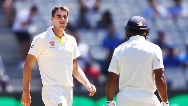 Australian paceman Pat Cummins exchanges words with Indian opener Mayank Agarwal at the MCG. Picture: Getty Images