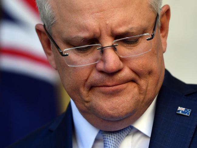 CANBERRA, AUSTRALIA - MAY 14: Prime Minister Scott Morrison reacts during a press conference in the Prime Ministers Courtyard at Parliament House on May 14, 2020 in Canberra, Australia. Australia's unemployment rate has recorded its biggest monthly rise ever, as 594,300 people lost jobs in April as coronavirus (COVID-19) restrictions shut thousands of businesses around the country and affected many more. The official jobless rate published by Australian Bureau of Statistics (ABS) has now climbed to 6.2 per cent.  (Photo by Sam Mooy/Getty Images)